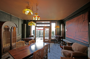 Row House Cafe Interior with salvaged doors windows lighting