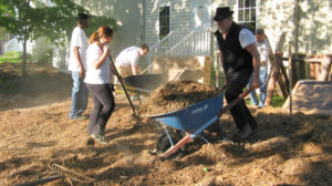 Whatcom Community College students mulching the RE Patch community garden and forest garden demonstration site