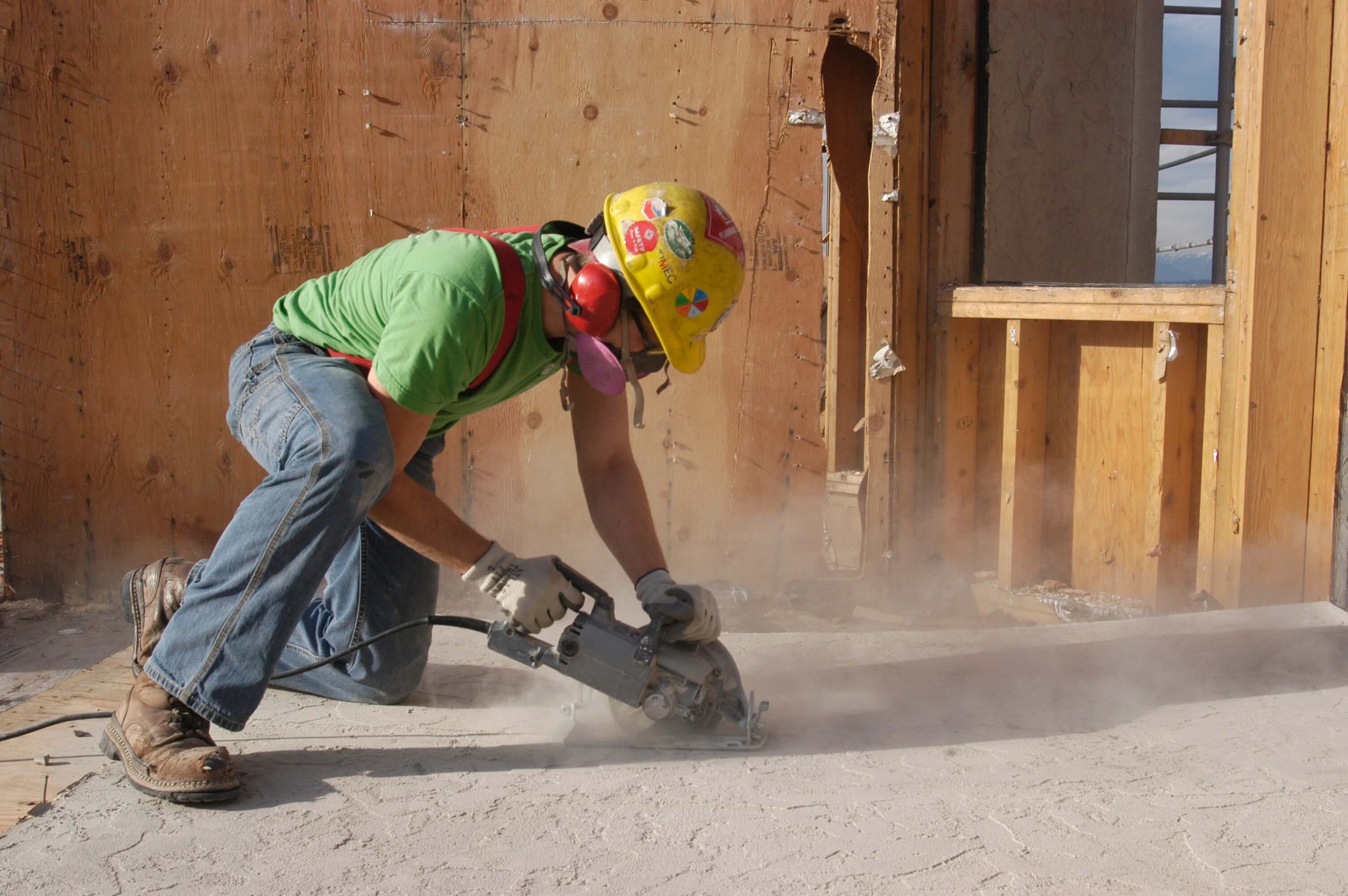 Salvage Crew member removing flooring